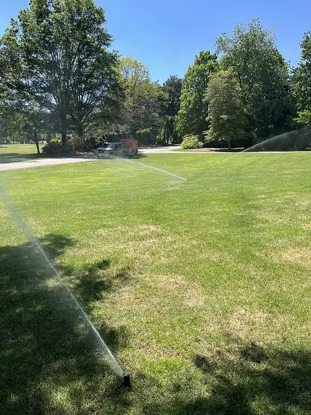 Irrigation system running on a lawn in Upstate South Carolina